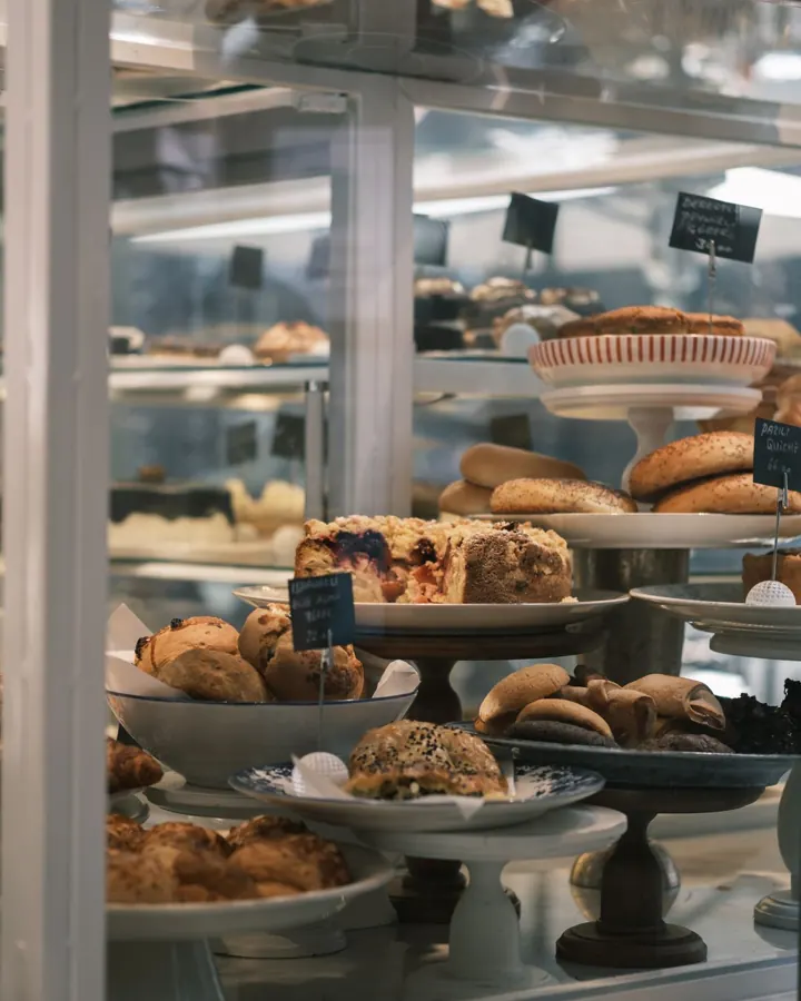 Cakes and pastries in a glass cabinet